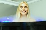 Happy woman receiving Cryotherapy at LuxCryo